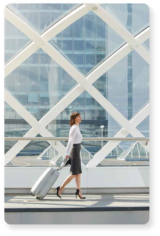 traveling-business-woman-walking-with-suitcase-in-2021-08-26-23-05-01-utc